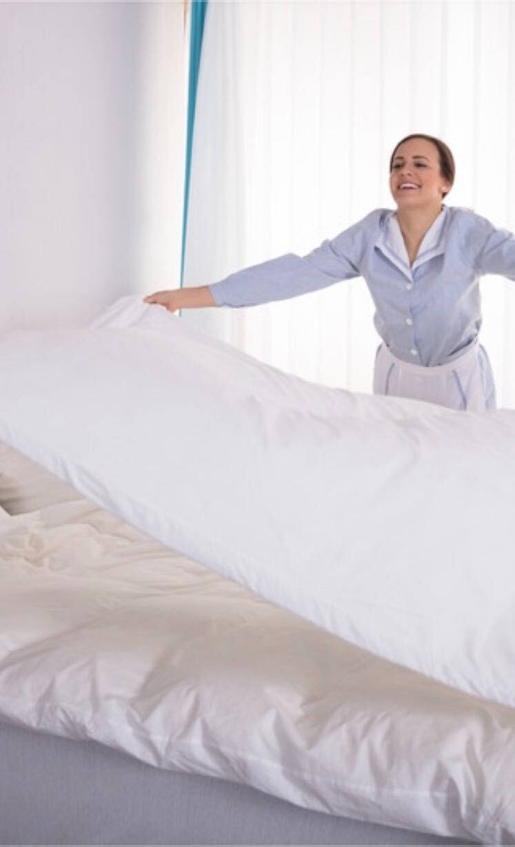 Clean sheets and fluffed pillows are important when doing spring cleaning