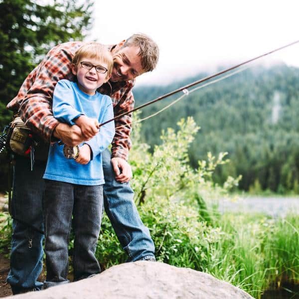 A father and son fishing.